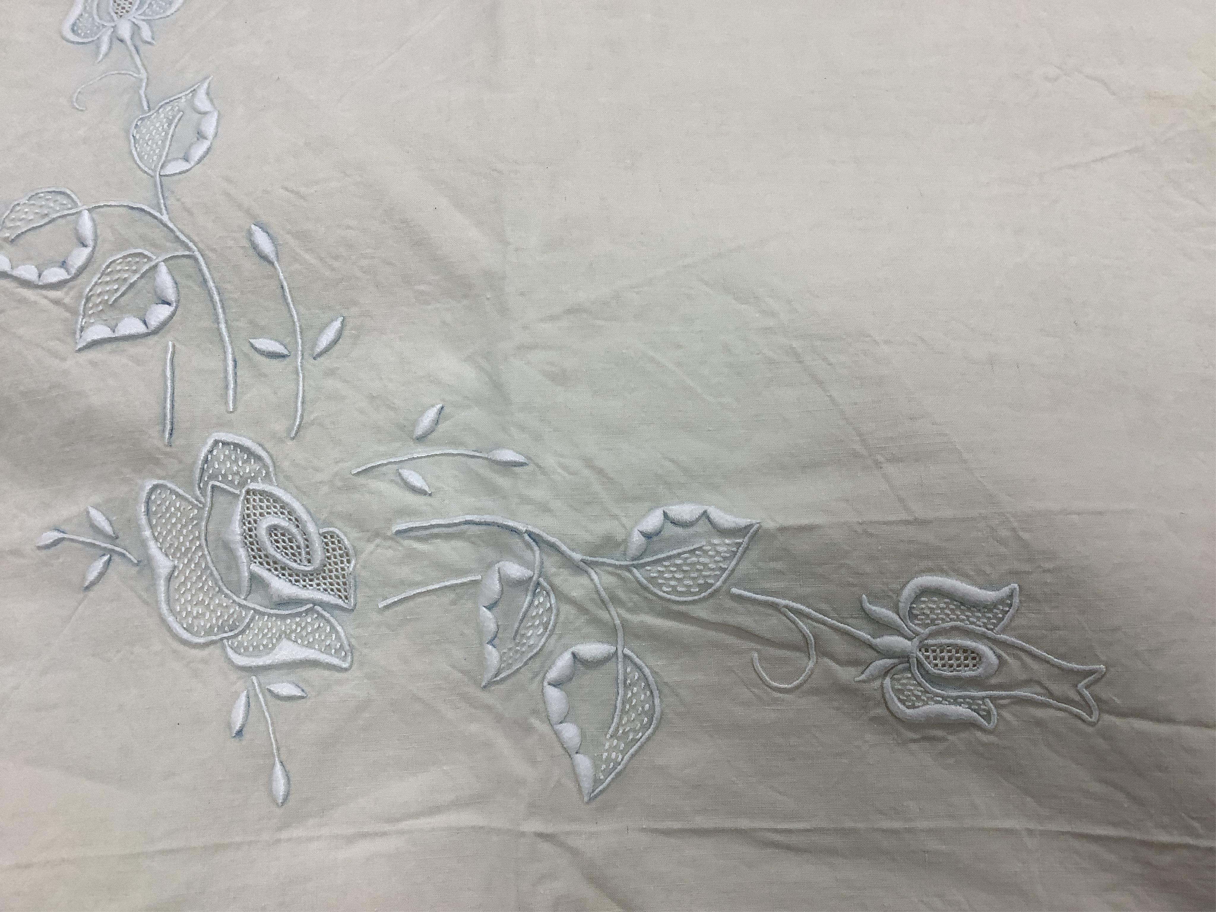Four French provincial linen floral embroidered and drawn thread turn back, wide and long top sheets. Each sheet with different embroidery, dimensions and shades of linen, being ecru to off white. Condition - ecru sheet,